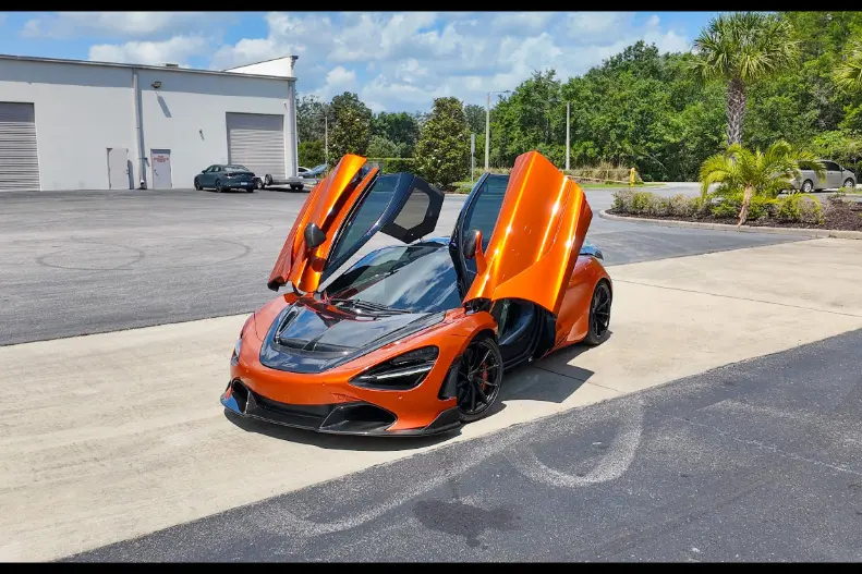 orange mclaren for rent in Orlando